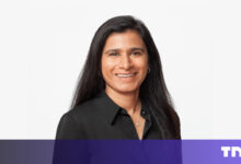 Headshot of Reshma Sohoni, smiling against a white background.