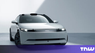 Front view of a sleek, white Afeela electric vehicle with black accents.