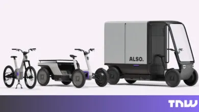 Three electric cargo bikes and a delivery vehicle in a studio setting.