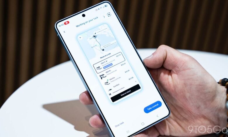 Hand holding smartphone displaying Uber ride options and prices.