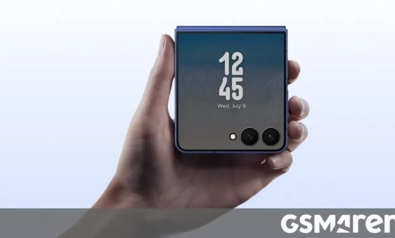 Hand holding a blue foldable smartphone displaying the time 12:45.