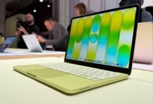 Lime green Apple MacBook Air on display, with colorful screen and white keyboard.