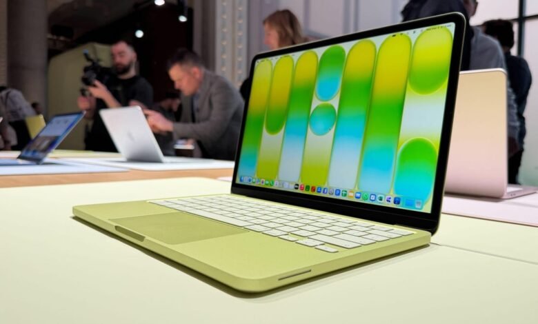 Lime green Apple MacBook Air on display, with colorful screen and white keyboard.
