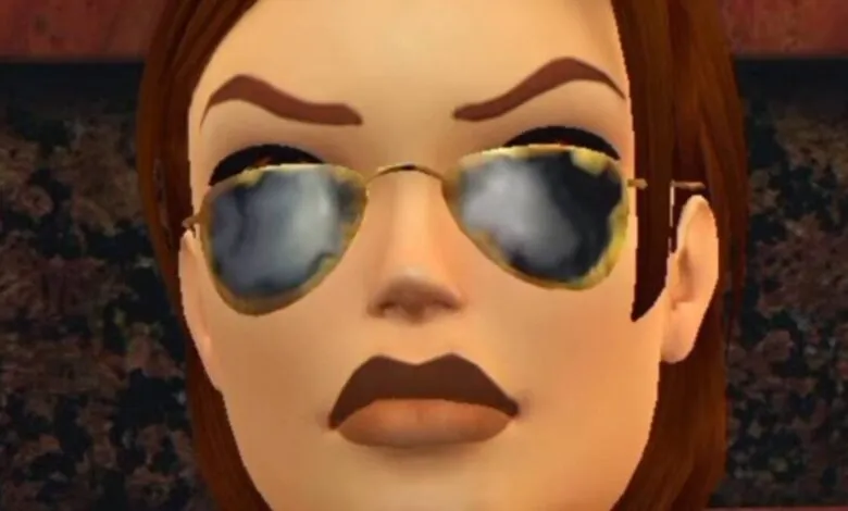 Close-up of Lara Croft wearing sunglasses, looking intense.