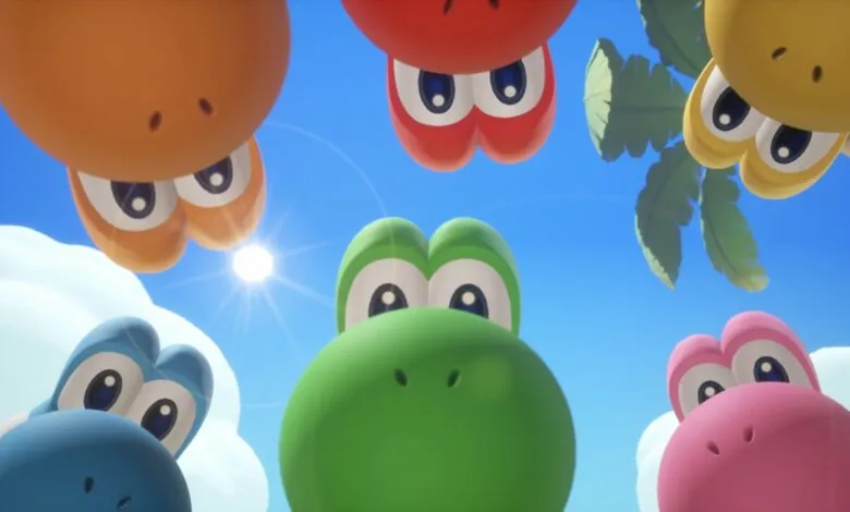 Colorful Yoshi characters look down from above against a bright blue sky.