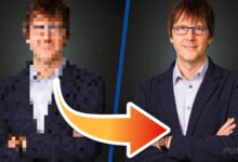 Pixelated image transforms into clear portrait of man with glasses and jacket.