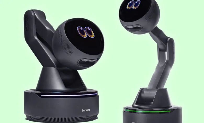 Two Lenovo smart home devices with animated eyes on a light green background.
