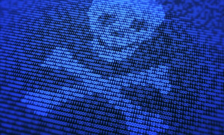 Abstract digital background with blue binary code pattern.