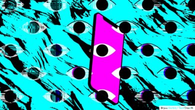 Abstract art: pink phone with eyes on a blue background with black streaks.