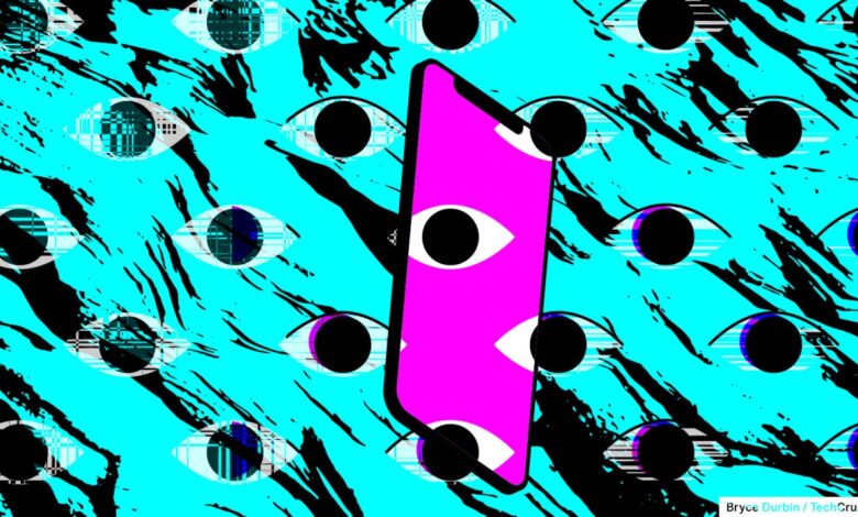 Abstract art: pink phone with eyes on a blue background with black streaks.