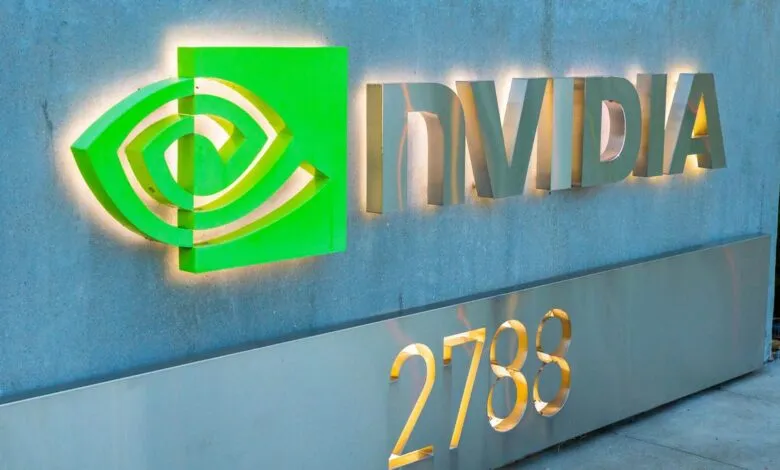 NVIDIA logo and building number, green eye symbol and silver letters.