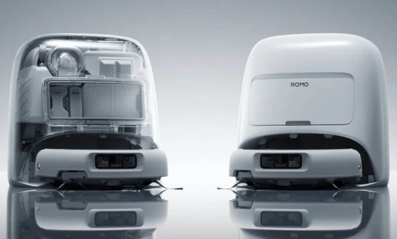 Two Romo robots, one transparent showing internal components, on a reflective surface.