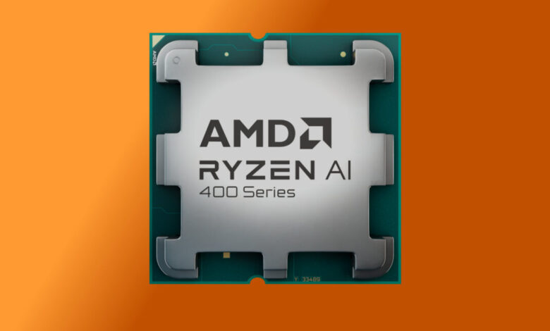 Close-up of an AMD Ryzen AI 400 Series processor on a green circuit board.