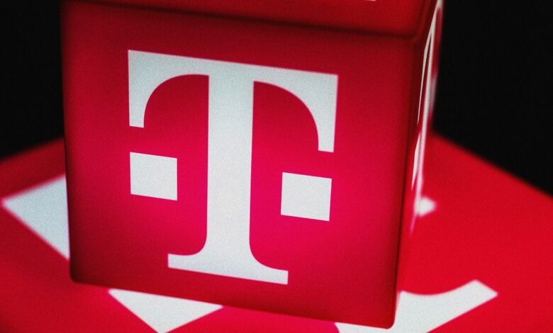 Close-up of T-Mobile logo on red cubes, white 'T' against vibrant red.