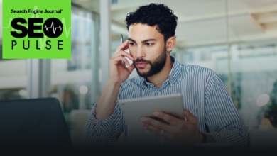 Man thoughtfully uses tablet with SEO Pulse logo in background.