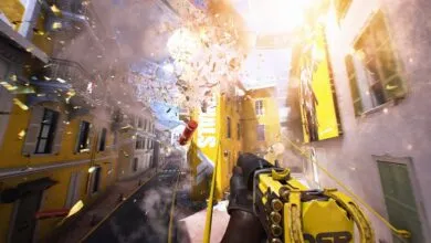 First-person view of a street explosion with confetti and a yellow weapon.