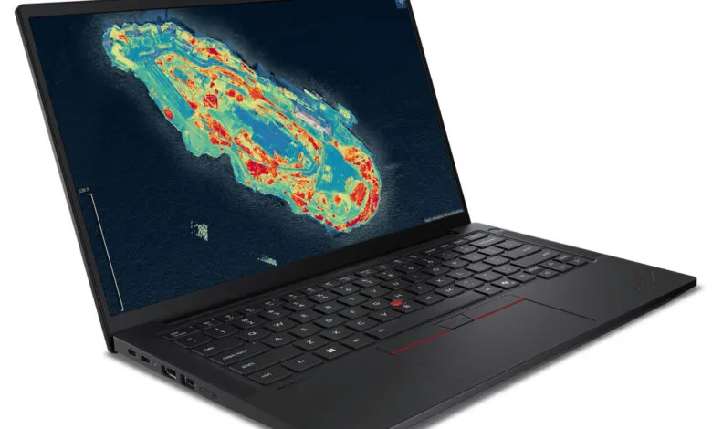 Black laptop displaying a thermal image of a building on its screen.