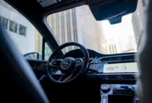 Interior view of a Waymo Jaguar I-PACE autonomous vehicle.