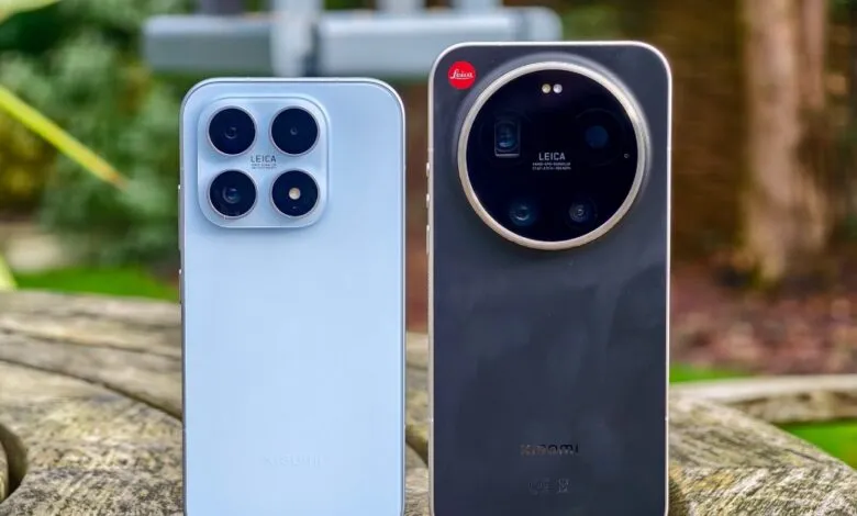 Two Xiaomi phones, one light blue with four cameras, one black with a large circular camera module.