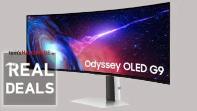 Samsung Odyssey OLED G9 curved monitor with space background.