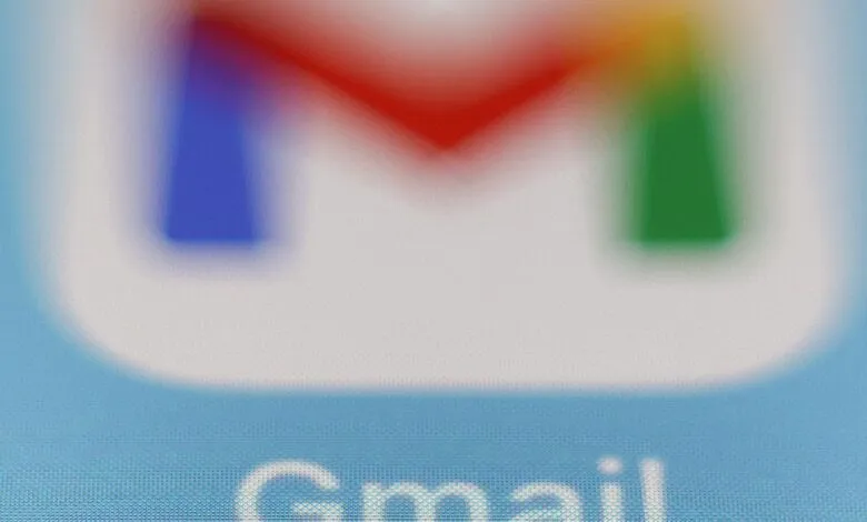 Close-up of the Gmail logo with blurred, vibrant colors.