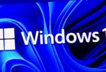 Windows 11 logo with blue abstract background.