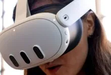 Person wearing a white Meta Quest 3 VR headset, close-up view.