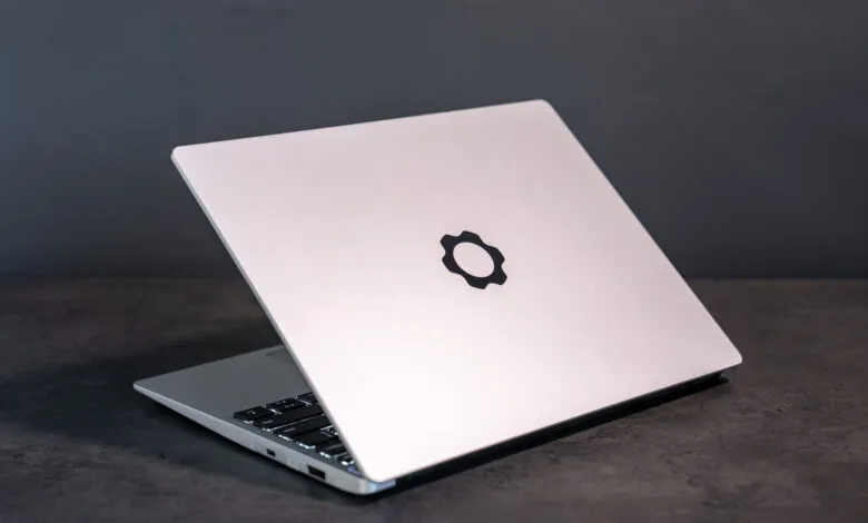 Silver Framework Laptop 13 AMD Edition, angled view, showing logo.