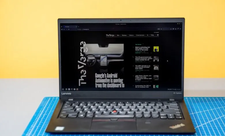 Lenovo ThinkPad X1 Carbon laptop displaying The Verge website.