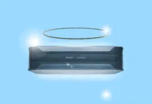 Conceptual solid state battery with a halo above it, floating in a blue sky.