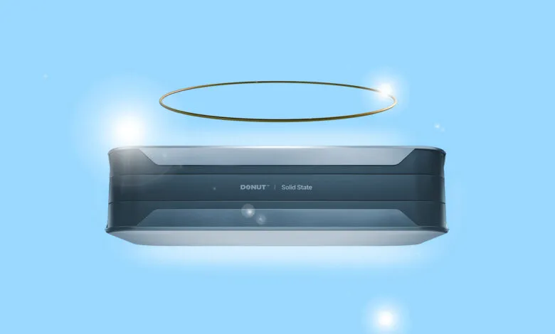 Conceptual solid state battery with a halo above it, floating in a blue sky.