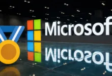 Microsoft logo with a gold medal graphic overlayed in the foreground.