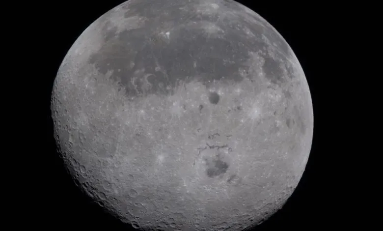 Detailed view of the moon's surface, showing craters and lunar maria.