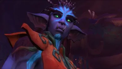 Close-up of a purple-skinned character with glowing green eyes and prominent tusks.