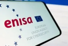 ENISA logo displayed on a smartphone screen, surrounded by blue stars.