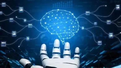 AI brain connected to data points, held by a robotic hand.