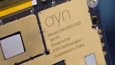 Close-up of AYN Odin3 SoC with heatsinks, showing model and assembly details.