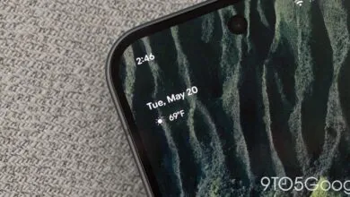 Close-up of a phone screen displaying the date, time, and weather.