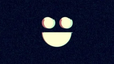 Simple smiling face icon with glitch effect on dark speckled background.