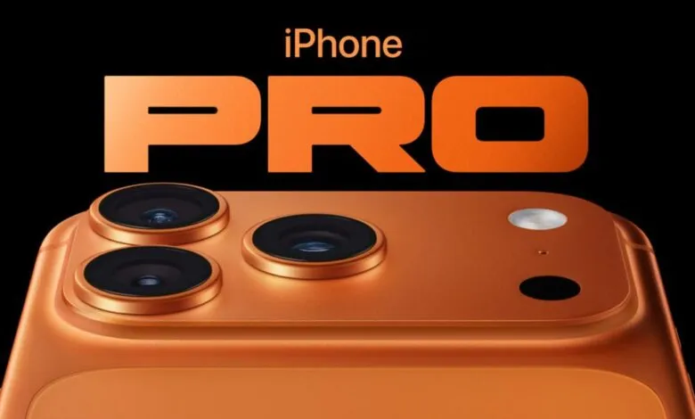 Close-up of an orange iPhone Pro with three camera lenses.