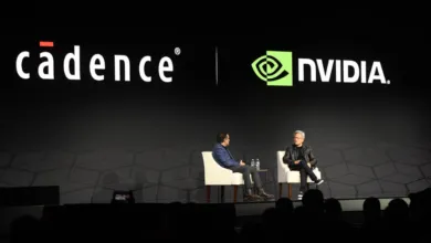 Cadence and Nvidia logos displayed on stage with two men seated in chairs.