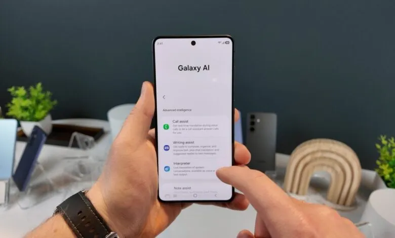 Samsung phone displaying Galaxy AI features, held in hand.