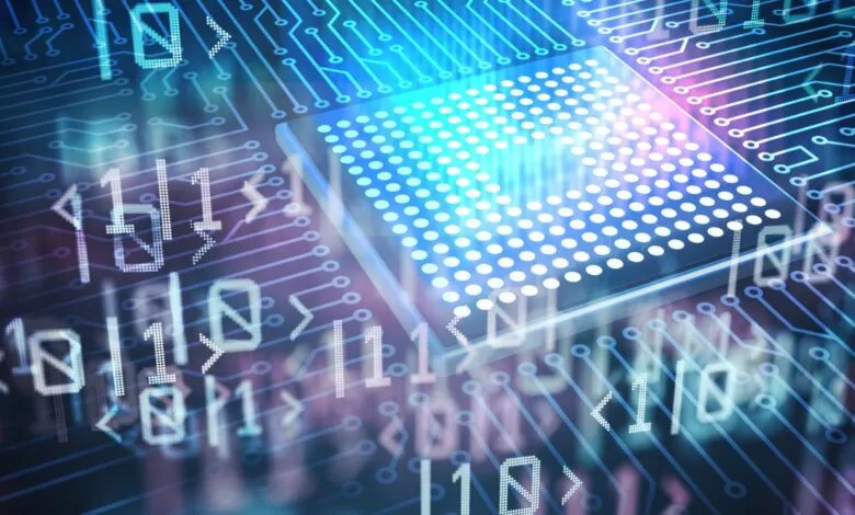 Close-up of a glowing blue computer chip on a circuit board with binary code.