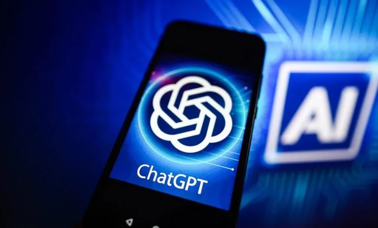 Smartphone displaying the ChatGPT logo against a blue AI background.