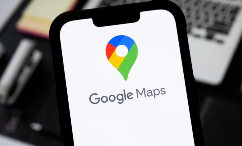 Smartphone displaying the Google Maps app logo on a white screen.