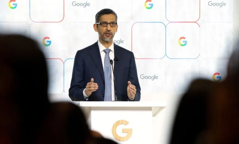 Sundar Pichai speaks at podium with Google logo backdrop.
