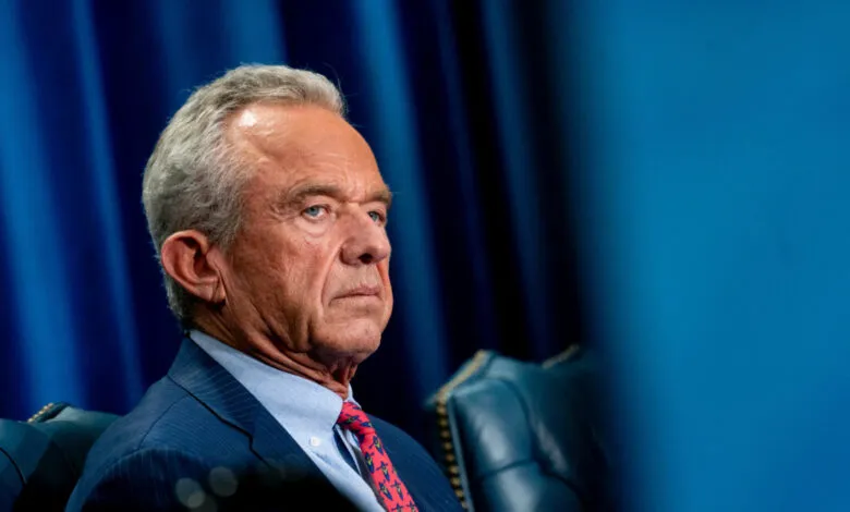 Portrait of Robert F. Kennedy Jr. in a suit and tie.