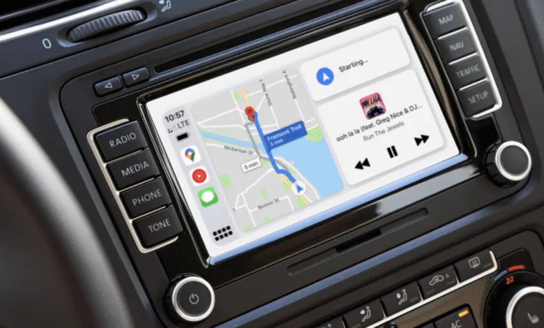 Car dashboard display showing Google Maps navigation and music playback.