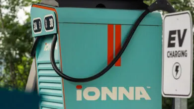 IONNA electric vehicle charging station with EV charging sign.