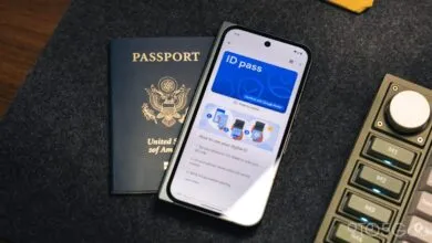 Passport and phone displaying ID pass in Google Wallet app.